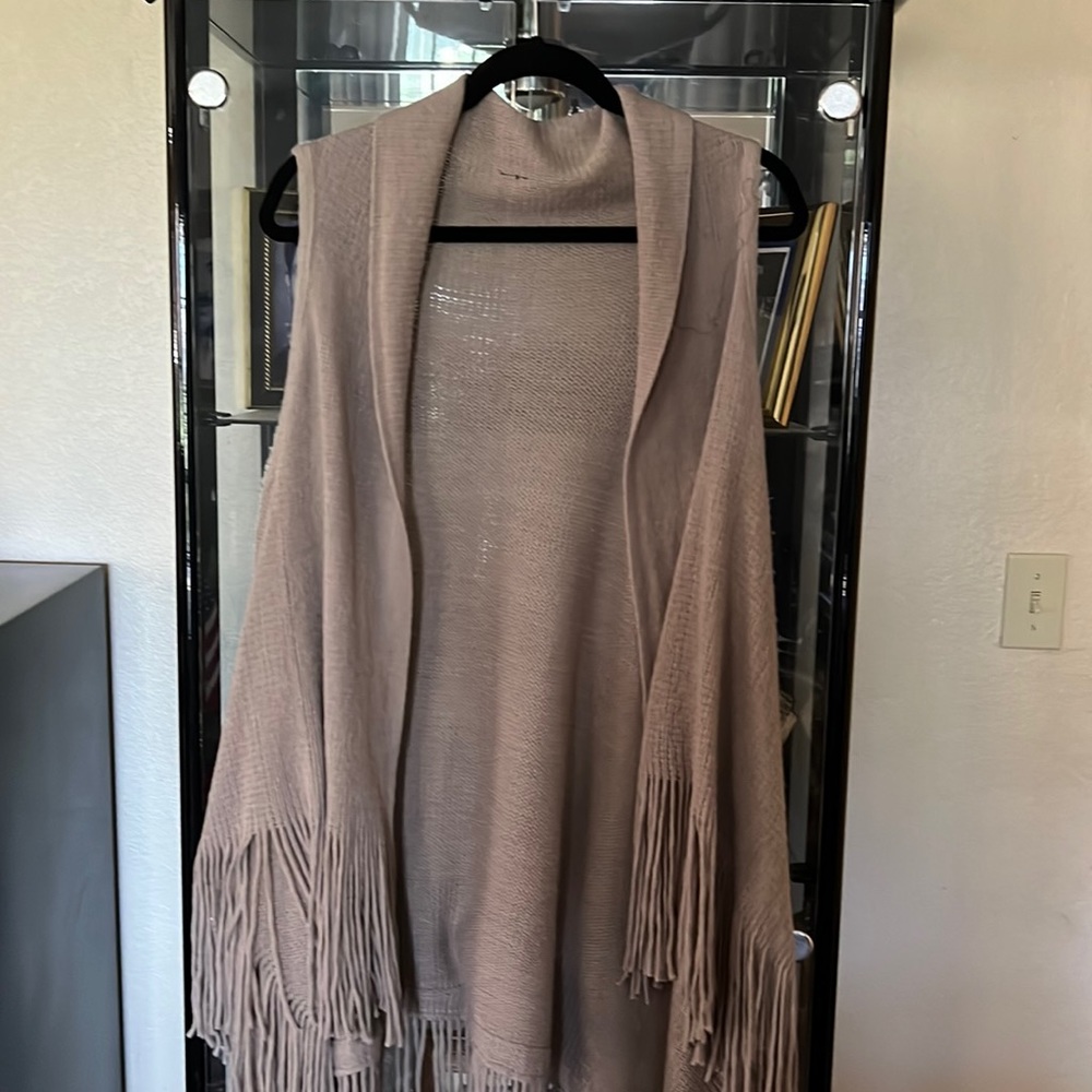 Knitted Fringe Vest. In a light brown almost taupe color. One size.